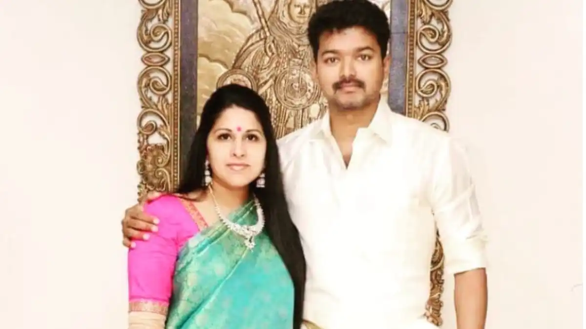 Vijay Thalapathy with wife Sangeetha Sornalingam at an event, showcasing age grace and elegance.